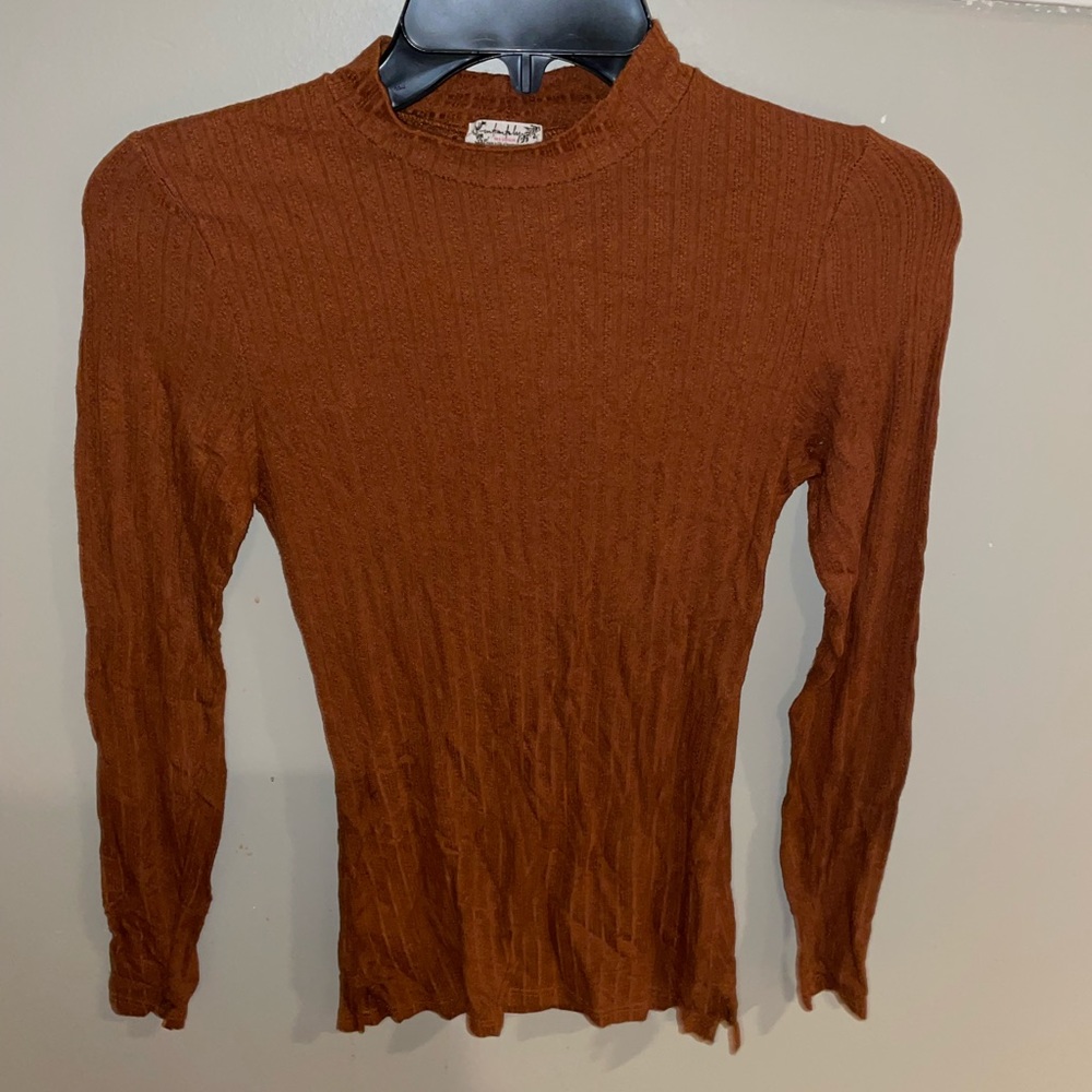 Rust colored gently worn